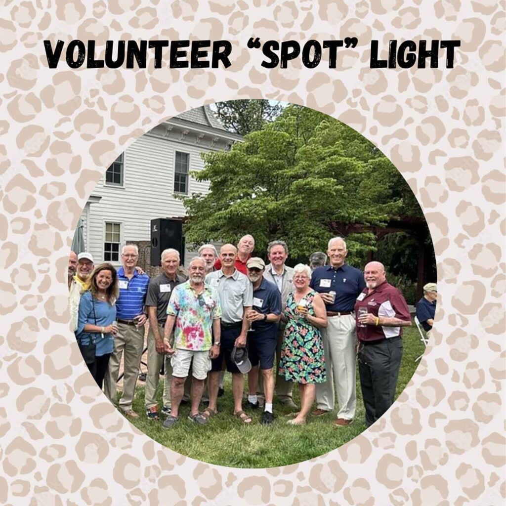 Members of the Class of 1973 are pictured on a leopard background with the words "Volunteer 'Spot' Light" above the crowd. 