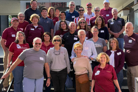 Alumni gather in a restaurant.