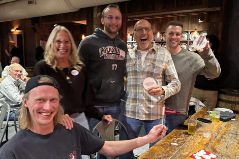 Alumni gather in a restaurant.