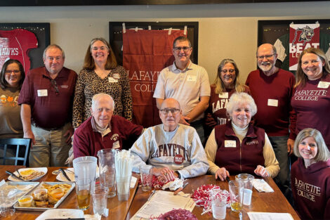 Alumni gather in a restaurant.
