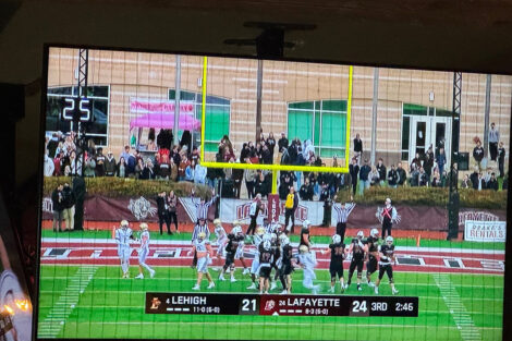 Close up of a tv screen with the Lafayette-Lehigh score.